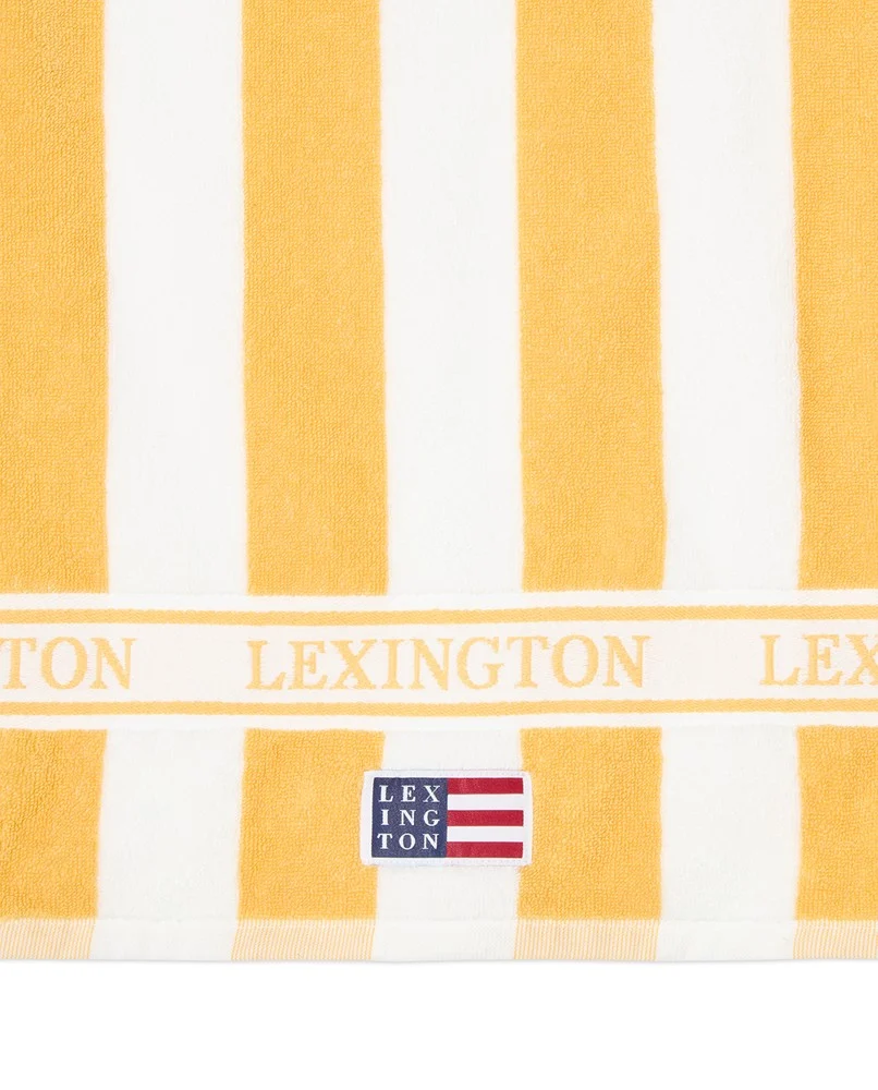 Blokkstripet strandhåndkle i bomullsfrotté, gul